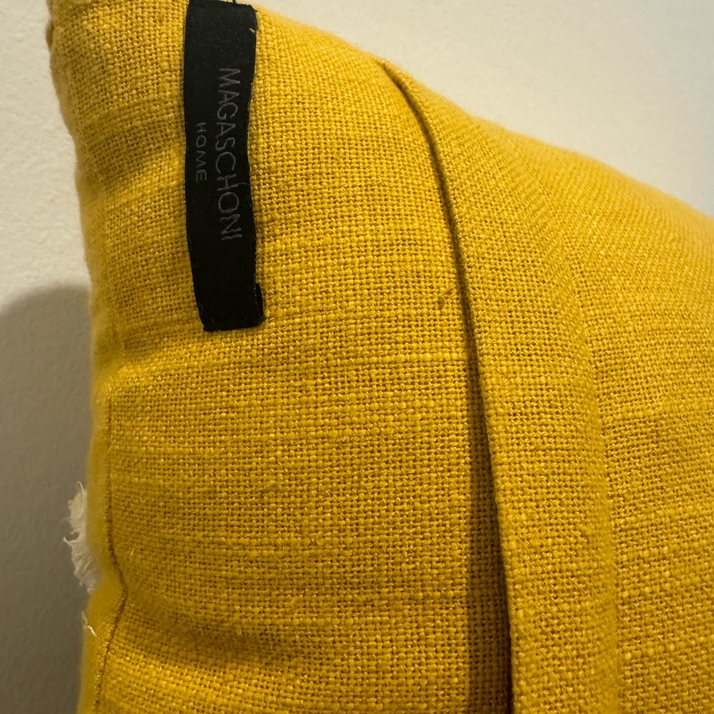 Statement accent pillow with a lot of detail and texture.